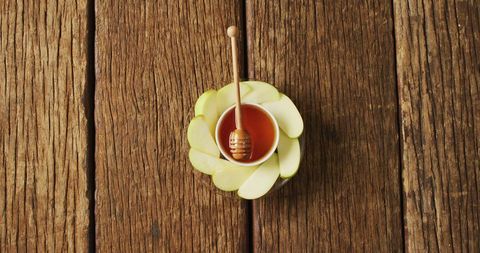 Honey and Apple Slices on Rustic Wooden Surface - Download Free Stock Images Pikwizard.com