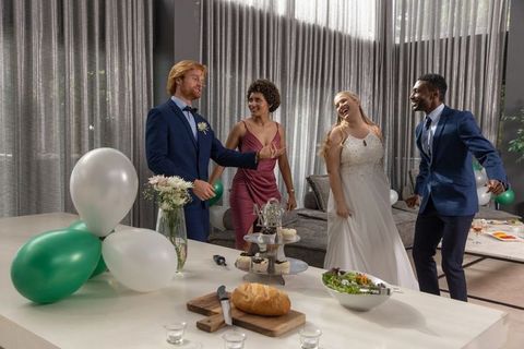 Joyful wedding party celebrating with dance and laughter