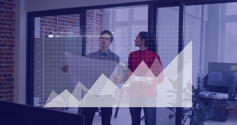 Colleagues Analyzing Financial Data Graphs in Modern Office