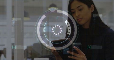 Asian woman interacting with futuristic ar interface in modern office