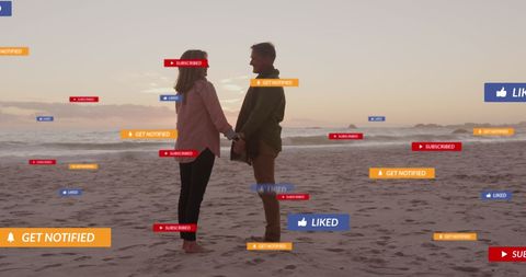 Caucasian Couple on Beach Surrounded by Social Media Icons