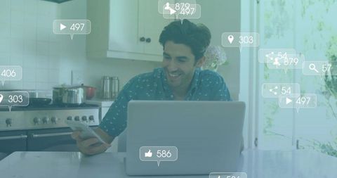 Man in Kitchen Engaging on Devices with Social Media Overlays