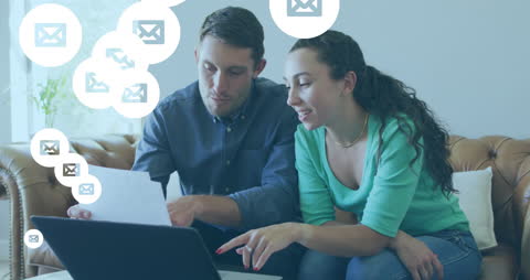 Couple Analyzing Email Notifications on Laptop