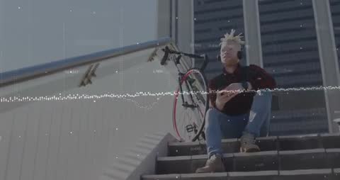 Urban Man with Bicycle Using Smartphone and Technology Interplay