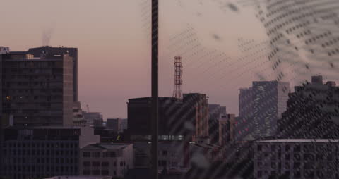 Urban Cityscape with Digital Overlay at Dusk