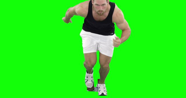 Man in athletic wear sprinting against green screen background. Ideal for use in fitness and exercise promotions, health and wellness advertisements, or sports training content.