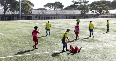 Competitive Soccer Match with Players in Action