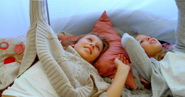 Happy Children Relaxing in Blanket Fort During Indoor Play - Download Free Stock Images Pikwizard.com