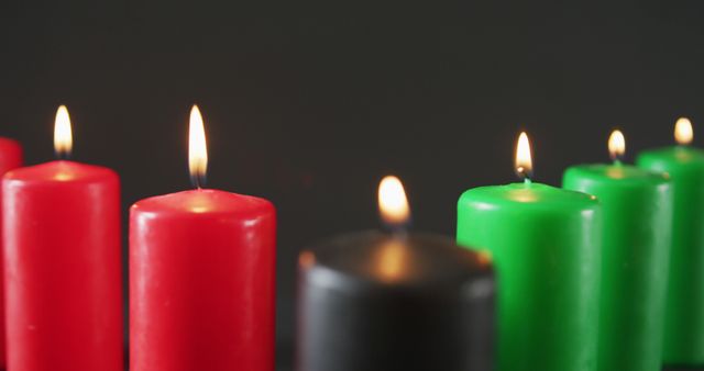 Lit Kwanzaa Candles in Traditional Red, Black, and Green Colors - Download Free Stock Images Pikwizard.com