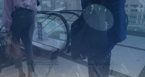 Globe and Data Graphics with Businessman on Escalator