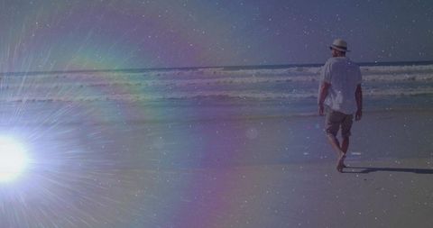 Calm Seaside Walk with Tranquil Lens Flare and Secluded Beach Scene