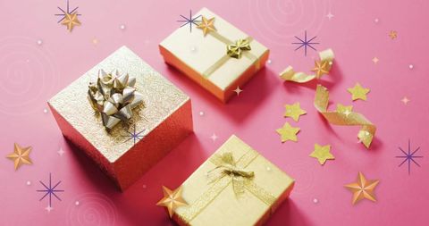 Celebratory Gift Boxes with Ribbons and Stars on Pink Background