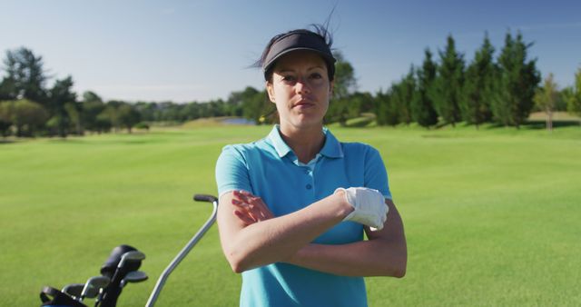 Confident Female Golfer Standing on Beautiful Golf Course - Download Free Stock Images Pikwizard.com