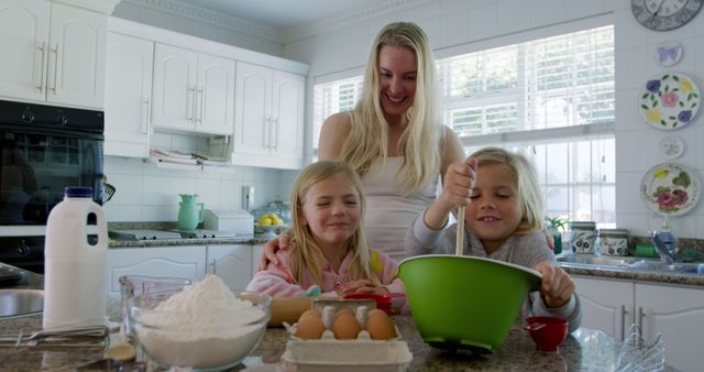 Mother Baking with Daughters in Modern Kitchen - Download Free Stock Images Pikwizard.com
