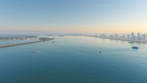 Calm waters meeting urban skyline in bay of bengal maritime scene