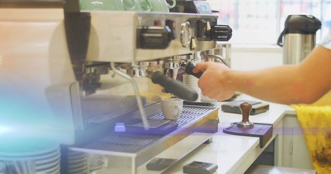 Barista Preparing Espresso in Modern Cafe