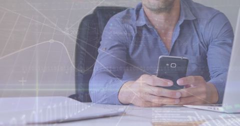 Businessman Using Smartphone with Digital Financial Overlay - Download Free Stock Images Pikwizard.com