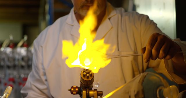 Scientist Heating Substance with Burner Flame in Laboratory - Download Free Stock Images Pikwizard.com