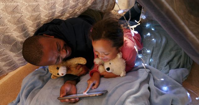 Father and Daughter Bonding in Blanket Fort with Fairy Lights - Download Free Stock Images Pikwizard.com