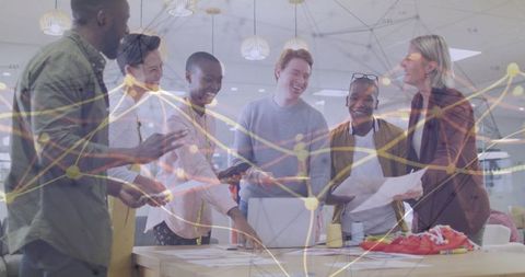 Diverse Team Collaborating on Business Strategy with Visual Data