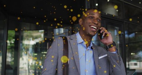 Businessman Communicating on Smartphone Outdoors with Digital Elements