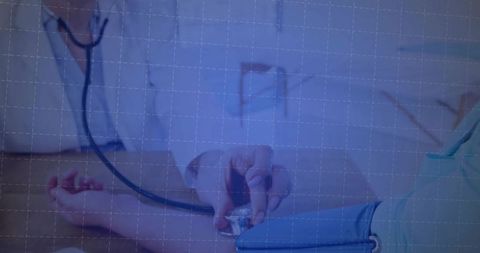 Doctor Checking Blood Pressure at Clinic for Health Diagnosis