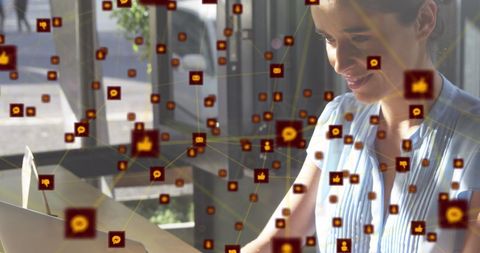 Woman Using Laptop with Digital Network Connections