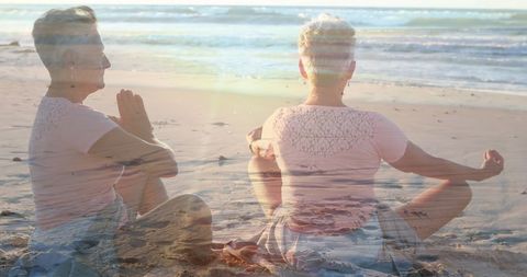 Woman Meditating on Beach During Sunset - Download Free Stock Images Pikwizard.com