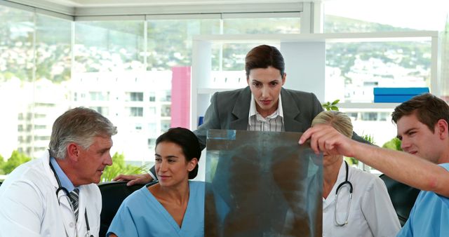 Medical Team Analyzing X-Ray in Hospital Meeting - Download Free Stock Images Pikwizard.com