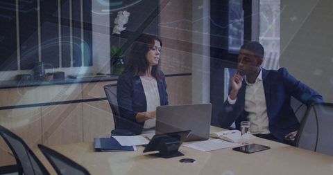Business Professionals Collaborating in Modern Office Meeting Room