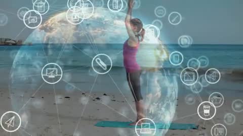 Mindful Yoga on Beach with Digital Data Overlay Representing Health and Wellness