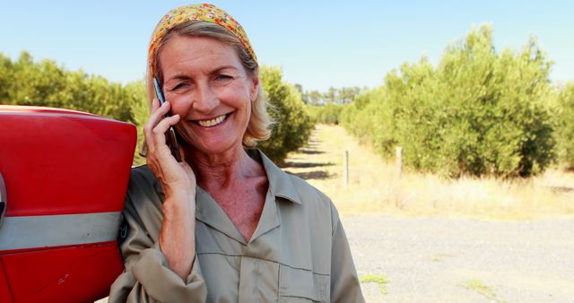 Senior Woman Farmer in Field Talking on Mobile Phone - Download Free Stock Images Pikwizard.com