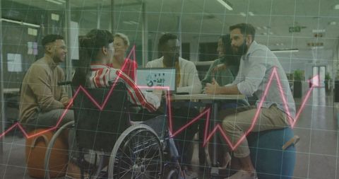 Diverse Team Collaborating with Financial Graph Overlay in Modern Office - Download Free Stock Images Pikwizard.com