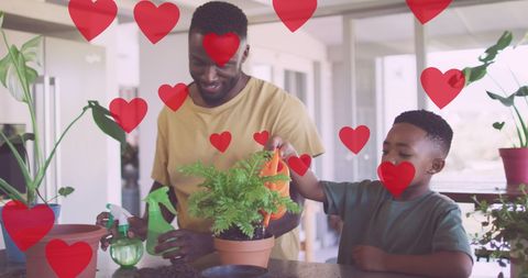 Father and Son Bonding Over Gardening in Home