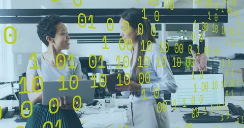 Collaborating over laptop with floating binary code in modern open office environment