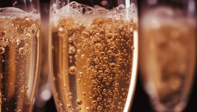 Champagne Flute with Bubbles in Elegant Bar Scene