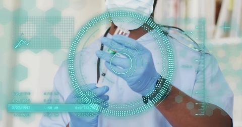 African american doctor analyzing digital data in hospital