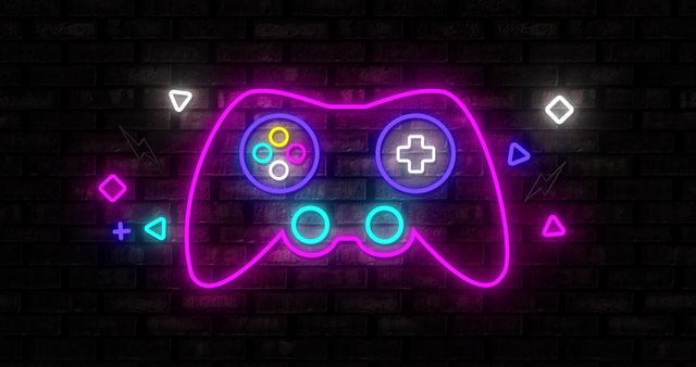 Neon Retro Video Game Controller on Dark Brick Wall - Download Free Stock Images Pikwizard.com