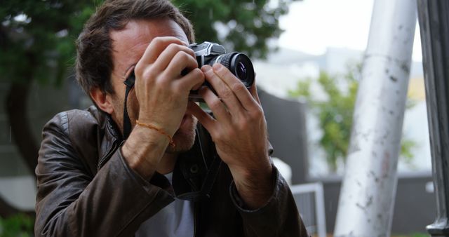 Photographer Capturing Outdoor Scene with Vintage Camera - Download Free Stock Images Pikwizard.com