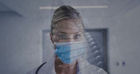Doctor with dna overlay in hospital corridor