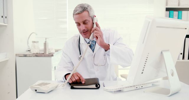 Confident Medical Professional Discussing Over Phone in Modern Office - Download Free Stock Images Pikwizard.com