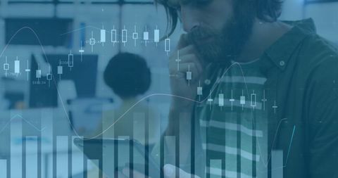 Businessman Analyzing Financial Data and Trends on Digital Tablet