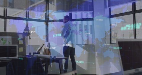 Businessman Analyzing Financial Data with World Map Overlay - Download Free Stock Images Pikwizard.com