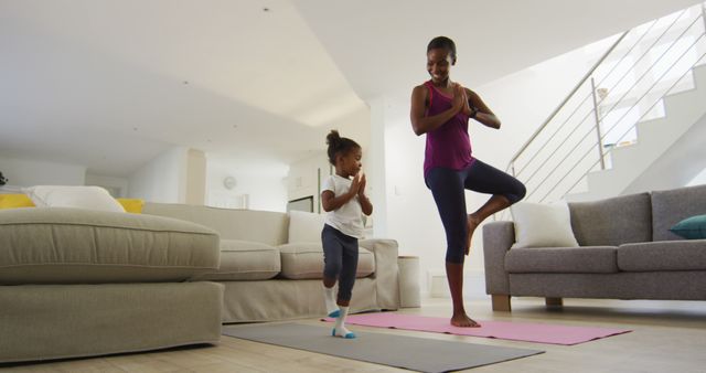 Mother and Daughter Enjoying Yoga at Home - Download Free Stock Images Pikwizard.com