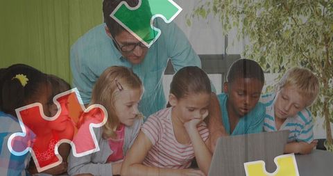 scene captures a male teacher guiding a group of diverse elementary students working together on a laptop computer. overlay of jigsaw puzzle pieces symbolizes problem-solving and autism awareness. this could illustrate modern, inclusive education methods highlighting teamwork, technological incorporation in classrooms, and awareness of autism. ideal for use in education content, autism seminars, inclusivity training programs, and general stories about school dynamics.