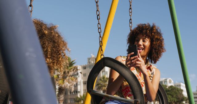 Mother Pushing Child on Swing at Park in Summer - Download Free Stock Images Pikwizard.com