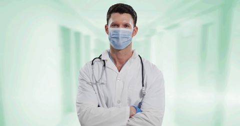 Confident Doctor Wearing Mask with Hospital Background