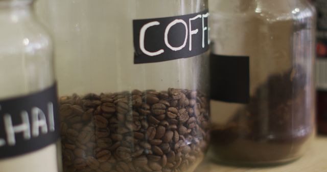 Image of jars with diverse type of coffee standing on shelf at coffee shop - Download Free Stock Photos Pikwizard.com