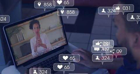 Remote Coaching Session Receiving Live Likes and Comments on Laptop for Virtual Engagement