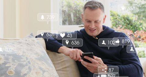 Senior Man Engaging on Social Media at Home